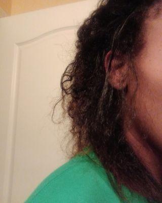 My hair after I washed & deep conditioned it at home. My hair usually curls right back up as soon as water hits it.