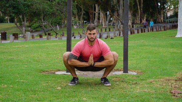 The Squat Stretch; great for opening the hips, mobilizing ankles, and working the core muscles.