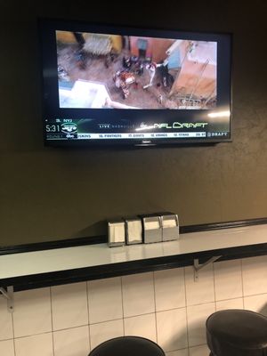 TV with a little bar section for sitting