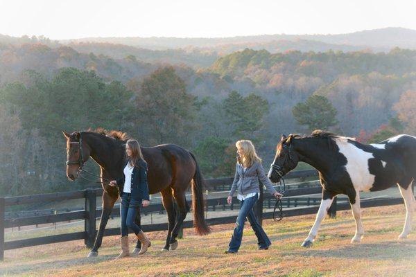 Claire and Gail walking into the sunset at Marble Hill Farm