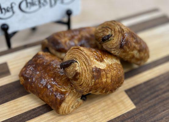 Our twist on the chocolate croissant... chocolate with salted caramel and bits of hazelnuts; that's how we "Bake It to the Next Level"