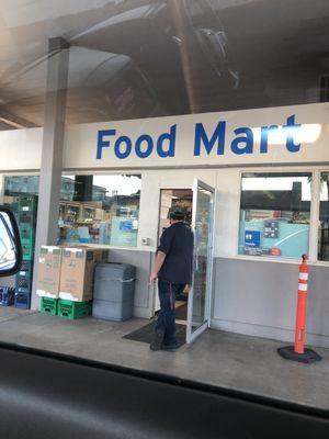 Chevron gas station attendant smokin a cig next to hubby and I pumping gas ‍