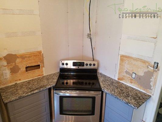 Client remodeling kitchen. Granite Countertops provided by Tradewinds Custom Designs. Project located in Navasota, TX