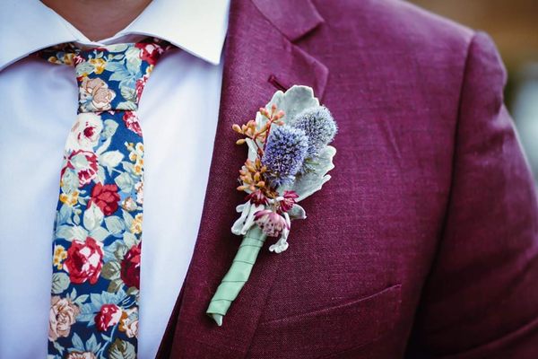 Groom with thistle bouquet