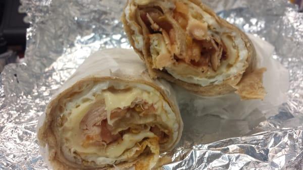 Egg whites, honey turkey, munster cheese, tomato whole wheat wrap.