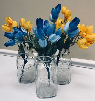 Mason jars and other centerpieces are available at The Legacy Center, included with the facility rental fee!