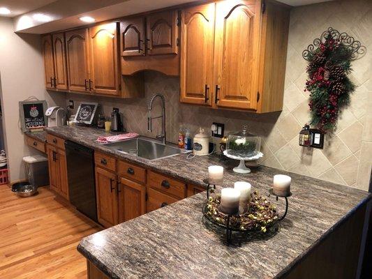 Bullnose edge color Cosmos Granite with single bowl drop in n sink.