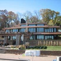 Lake Minnetonka Home. Custom Copper panels & rubber membrane flat roofs.