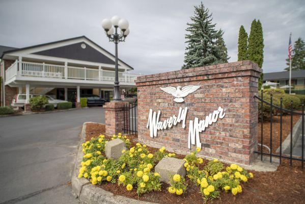 Beautiful sign with our apartment logo at the front entrance to our lovely community!