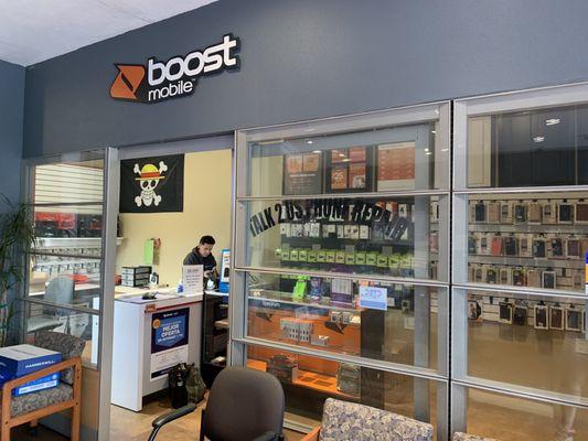 Talk 2 Us Phone Repair is located inside of the Boost Mobile, inside of a shared storefront. It's easy to miss if you're just driving by.