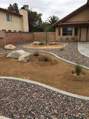 Xeriscaping is great out here in the desert. Very low maintenance.