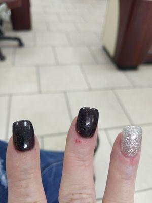 I asked her to please make my cuticles look better, she argued with me, trimmed one, cut me, and said she'd have to charge me for that!