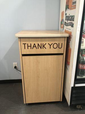 Garbage can with Thank You engraved