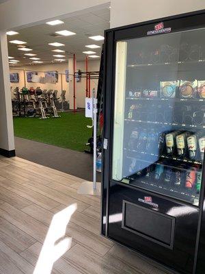 Vending machine with Bang energy drinks, protein cookies and other snacks.