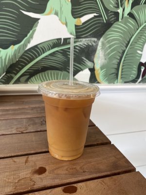 Iced decaf americano with macadamia nut milk