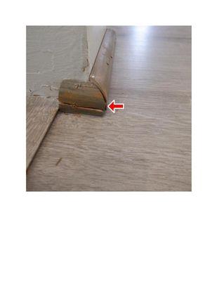 Discolored and Split Floor Trim