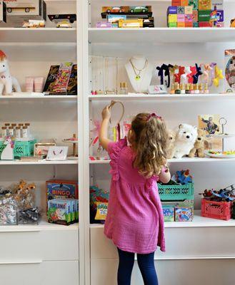 We have a fun selection of toys and hair accessories to browse, no appointment needed!