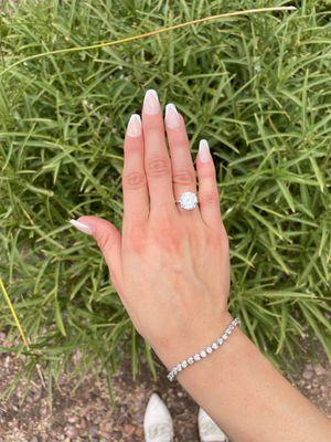 Tennis bracelet and 4ct round diamond.