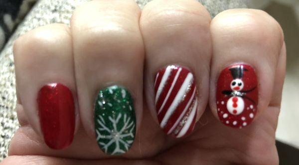 Christmas nails done wonderfully by Eva at LV Nails.