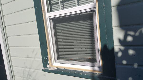 Lloyd used the wrong caulk on the outside of the window and screwed it in wrong, splitting it.