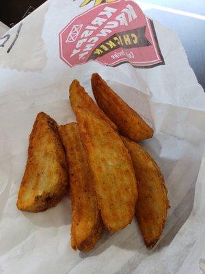 Thick cut wedge fries with seasoning