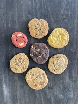 Triple Chocolate, Heathbar Crunch, Oatmeal Raisin, Red Velvet, Chocolate Chunk, Lemon Cooler, White Chocolate Cranberry.