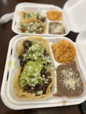 In the forefront are the Carne AsadaTacos, in the blurry distance are the Birria Tacos. Both are a must try!