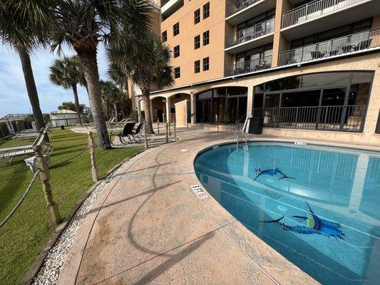 Specialty tile at the bottom of the pool