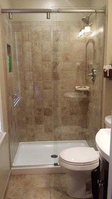 ALLSTATE GLASS provides shower enclosures.