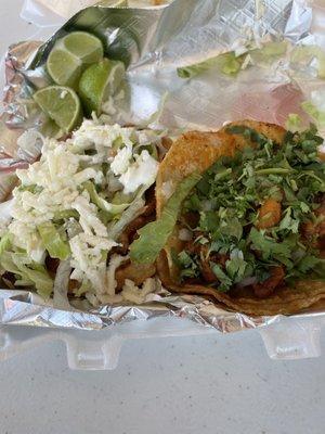 Sope and taco al pastor