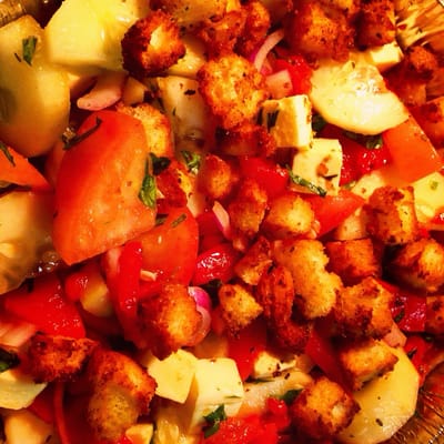 Specially made tomato salad, but mostly cucumbers, add roasted red peppers n fresh mozz, homemade croutons! The best!