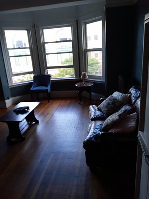 Living Room with Bay windows painted and trim.