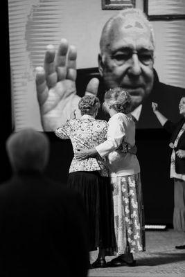 Women of the church praying for a minister who was diagnosed with cancer.