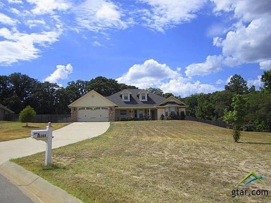 Beautiful home sitting on top of a hill, situated on .908 acre lot!  You'll love the gorgeous features of this home starting ...