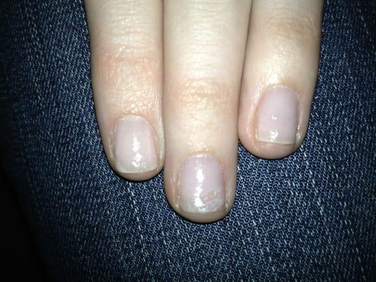 This was the manicure I got. The color is intentionally pale (my choice) but you can see the sloppy application over polishing.