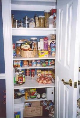 A small pantry with deep shelves, the picture of perfect organizing!