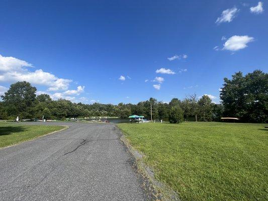 Road entering from parking lot and to boat launch ramp.