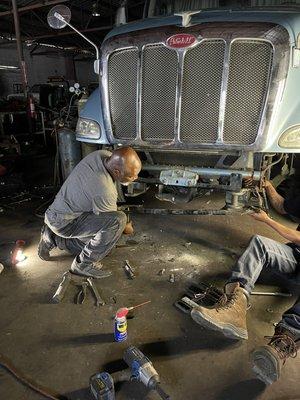 Owner installing a new bumper