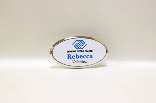 1.5 x 3 Oval Name Badge with a Silver Frame