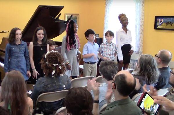 My students taking their bow at the year end recital.