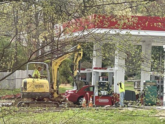 Excavations near the car pumping gas at Conoco