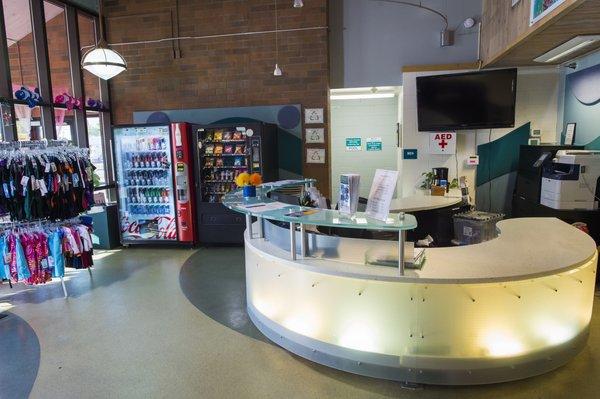 Reception area where guests can scan their membership cards or pay a drop-in fee. Coffee and snacks are also for sale.