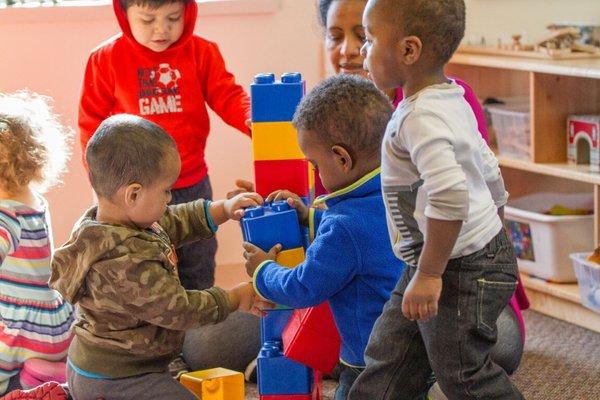 Children playing with blocks in children's center.