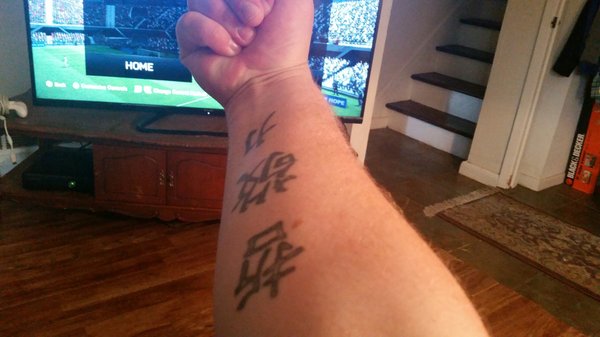 First Tat, from Rite of Passage. They were still at their original location in 2001