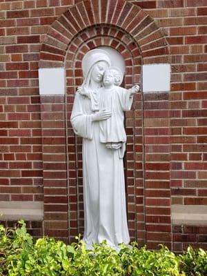 Beautiful statue of Madonna and child in the back parking lot!