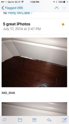 Sloppy workmanship.    The painter painted the baseboards after installation and only did one coat of paint, and didn't prime the wood.