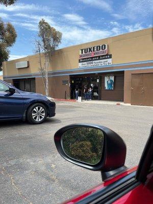 People waiting to be let in to the store. Like me they rang the doorbell and no one ever came, so they just left. It's 12:06 on a Saturday.