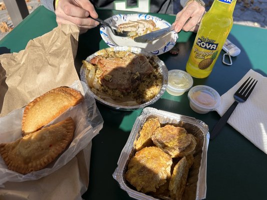 Empanadas , pork chop meal, pineapple soda, and tostones... soo good !