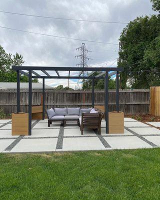 Concrete patio with crushed granite joints.