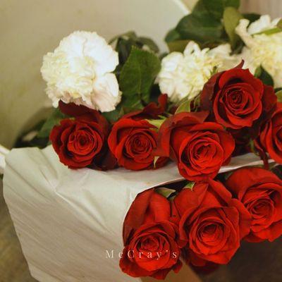 [Lovely Roses and beautiful White Carnations.]
 
 For more photos, visit our Instagram @McCraysFuneralAndFlowers